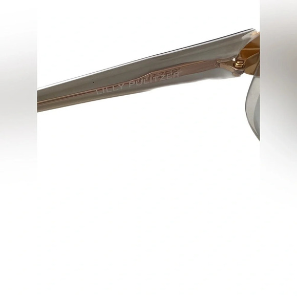 Lilly Pultzer wrap around sunglasses. Lenses has a few small scratches